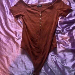 Orangish brown body suit